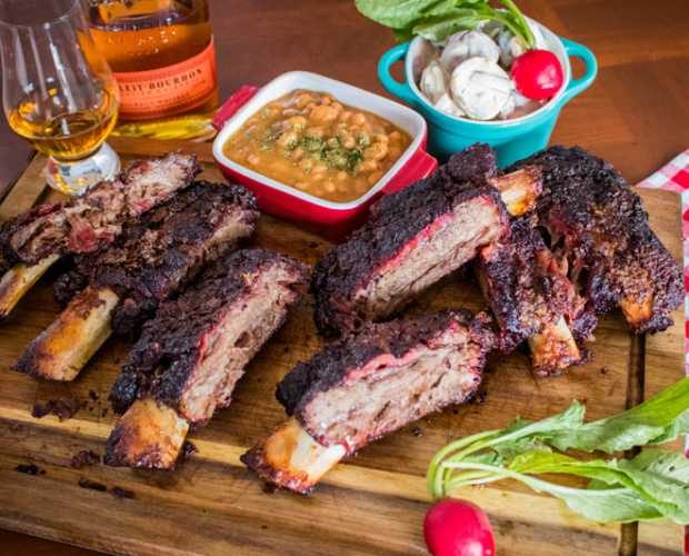 Image of a platter of slpw smoked barbecue Wagyu beef ribs